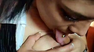 Natural Latina beauty indulges in self-sucking and tit play